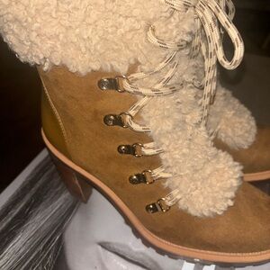 Jennifer Lopez Tan and Cream Heeled Boots